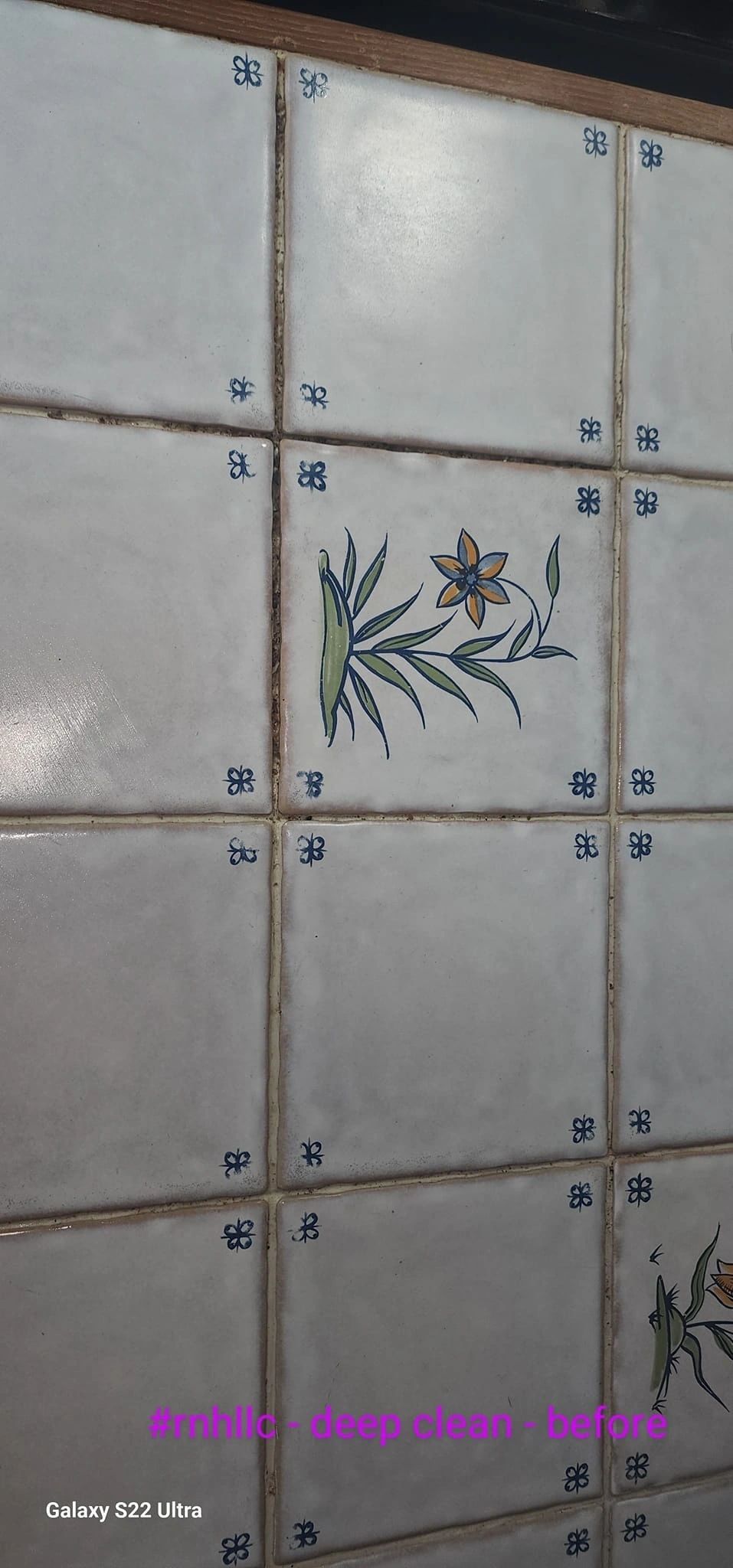 Kitchen tile backsplash before deep clean, with dust and grime built up in the grout lines